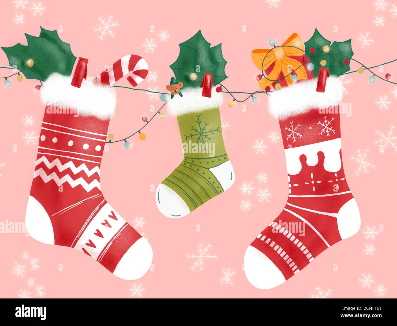 Dibujo a mano de tres calcetines de invierno colgando en la decoración de Navidad Foto de stock