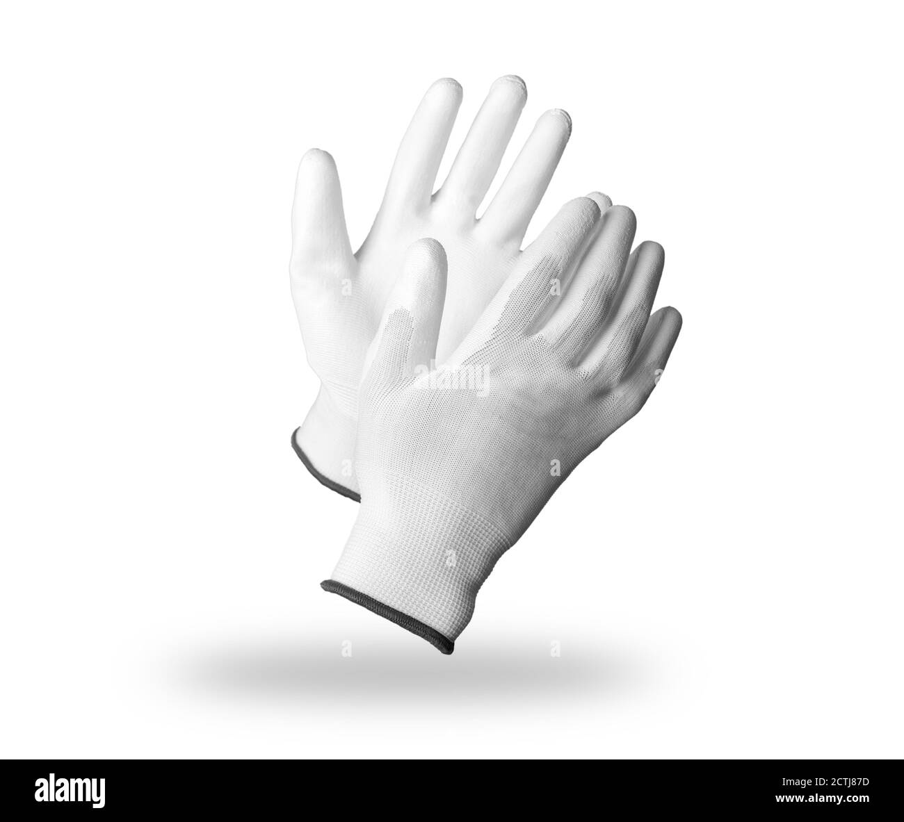 Par de guantes de trabajo de protección blancos aislados sobre fondo blanco con sombra suave Foto de stock