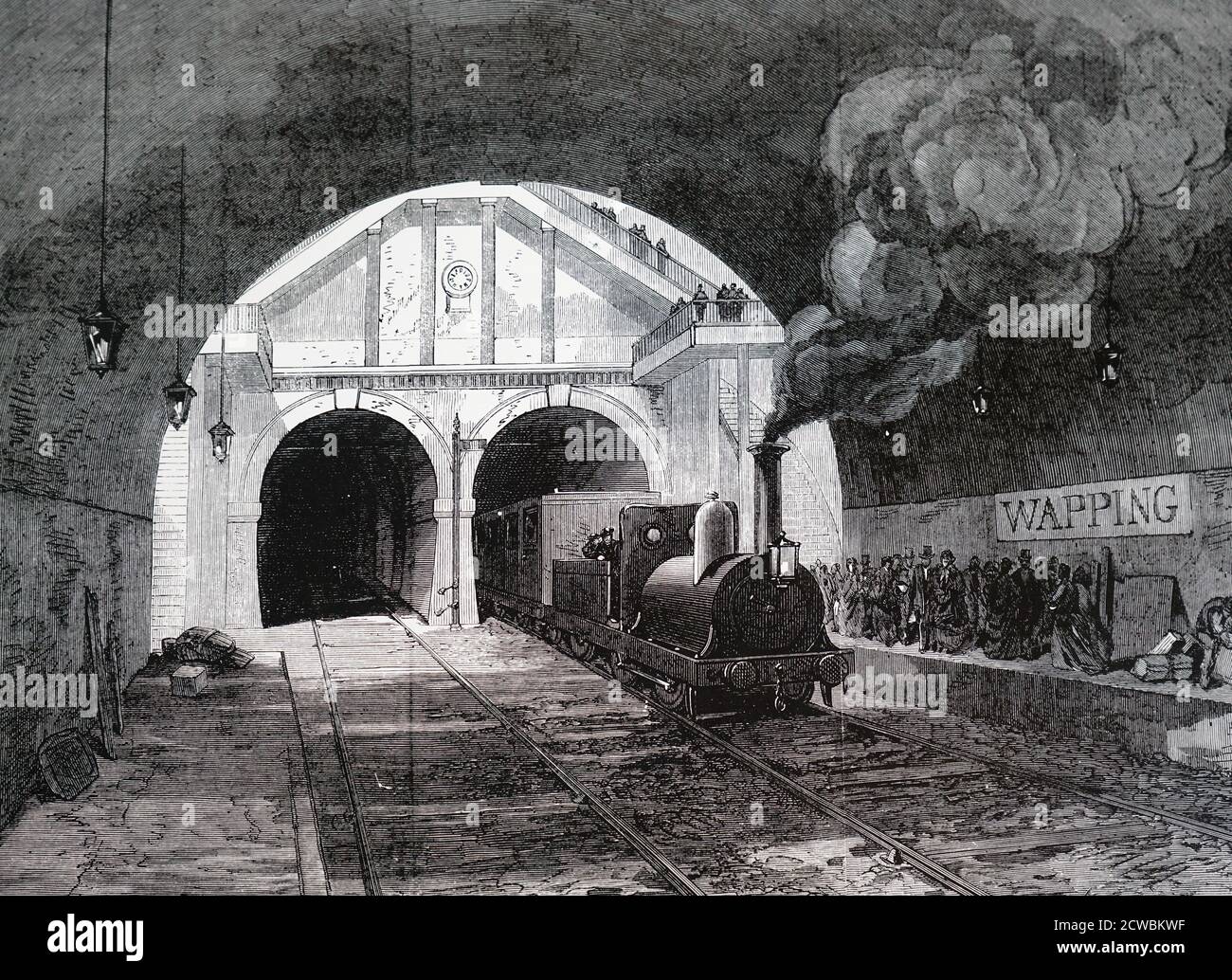 Grabado que representa un tren que sale del túnel del Támesis en Wapping. El túnel de Marc Isambard Brunel fue construido entre 1825 y 1843, y todavía es utilizado por trenes eléctricos que circulan entre Whitechapel y New Cross. Foto de stock