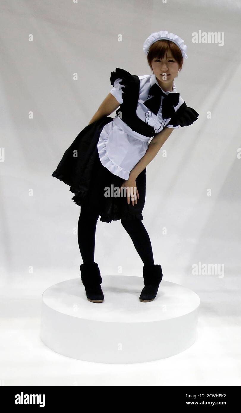 A booth assistant in costume poses for a 360-degree camera and software system called A booth assistant in costume poses for a 360-degree camera and software system called