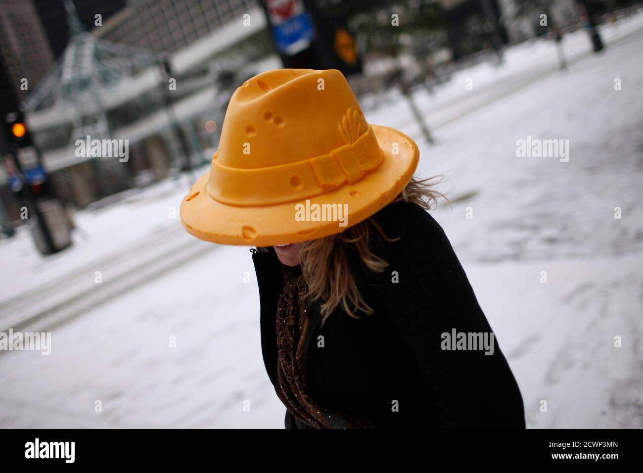 A Green Bay Packers fan wears a Packers 
