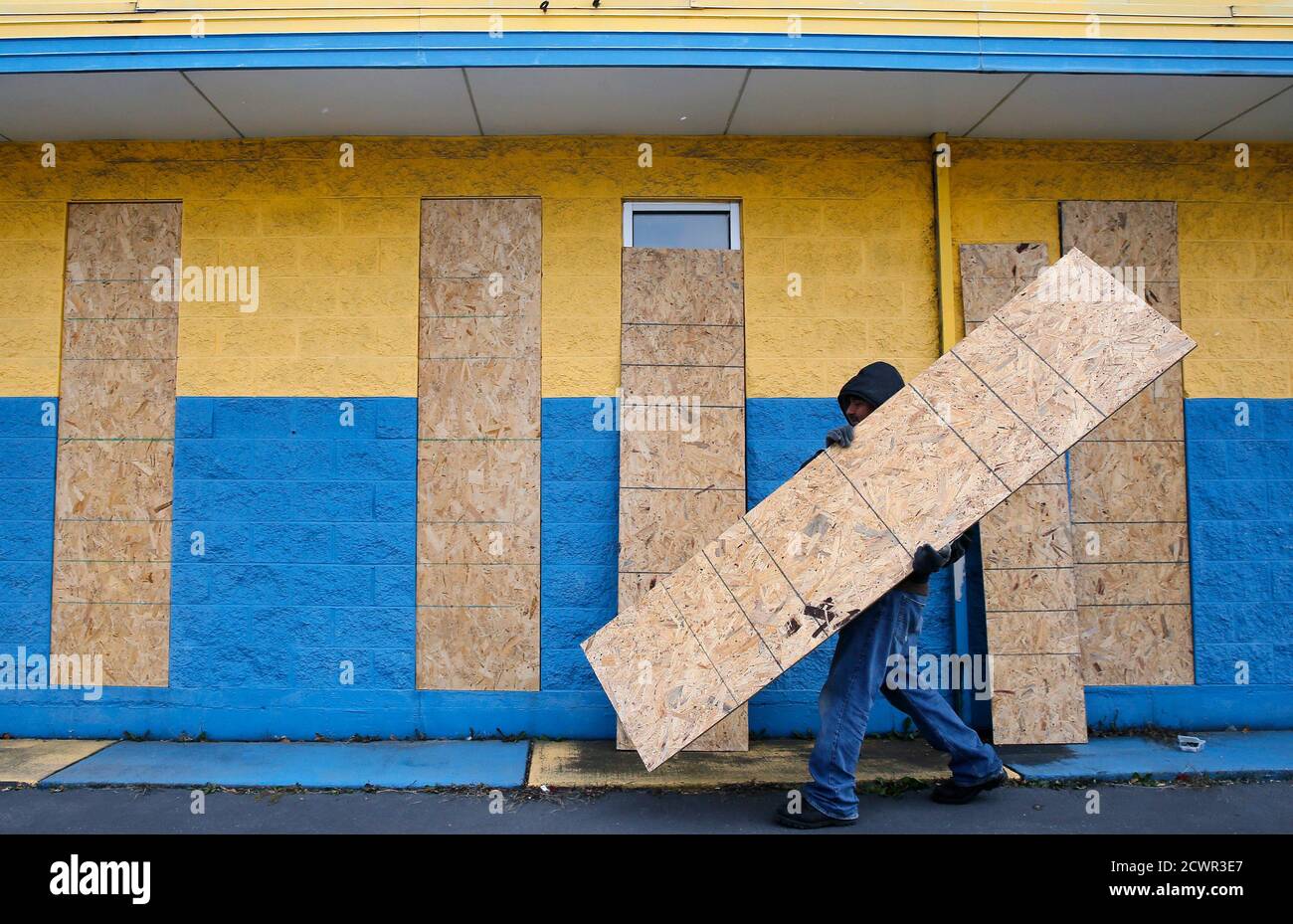 A Worker Boards Up A Business In Preparation For A Verdict From The Grand Jury In Ferguson Missouri November 13 2014 The Grand Jury Decision On Whether To Indict Darren Wilson A