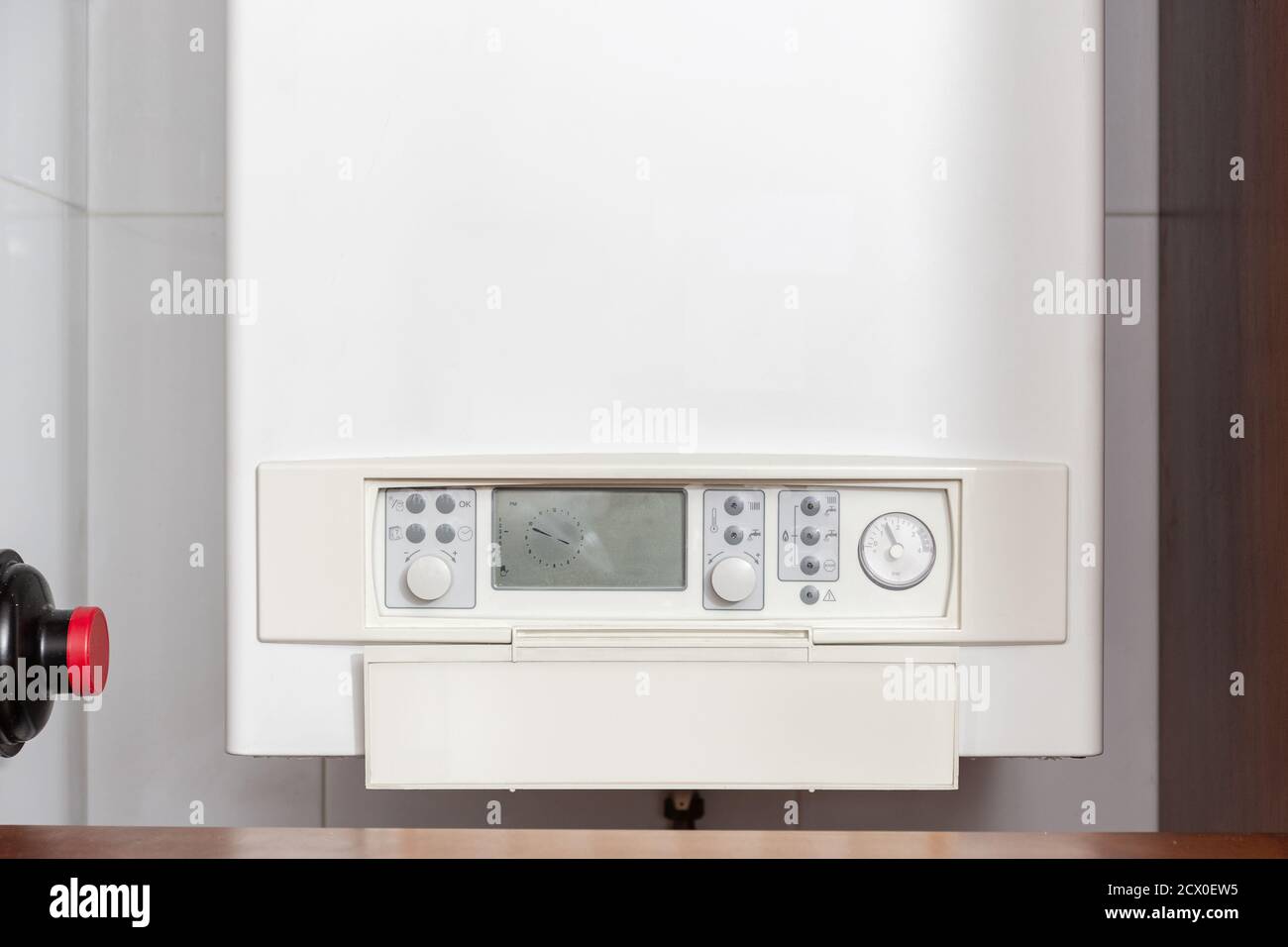 Calentador de agua de gas, panel de control o caldera de gas en un casa interior Foto de stock