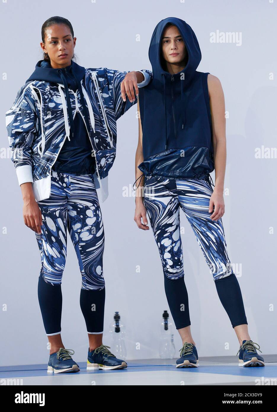 medio litro Mula Engreído Models present creations from the Adidas by Stella McCartney Spring/Summer  2014 collection during London Fashion Week September 17, 2013.  REUTERS/Suzanne Plunkett (BRITAIN - Tags: FASHION SPORT Fotografía de stock  - Alamy
