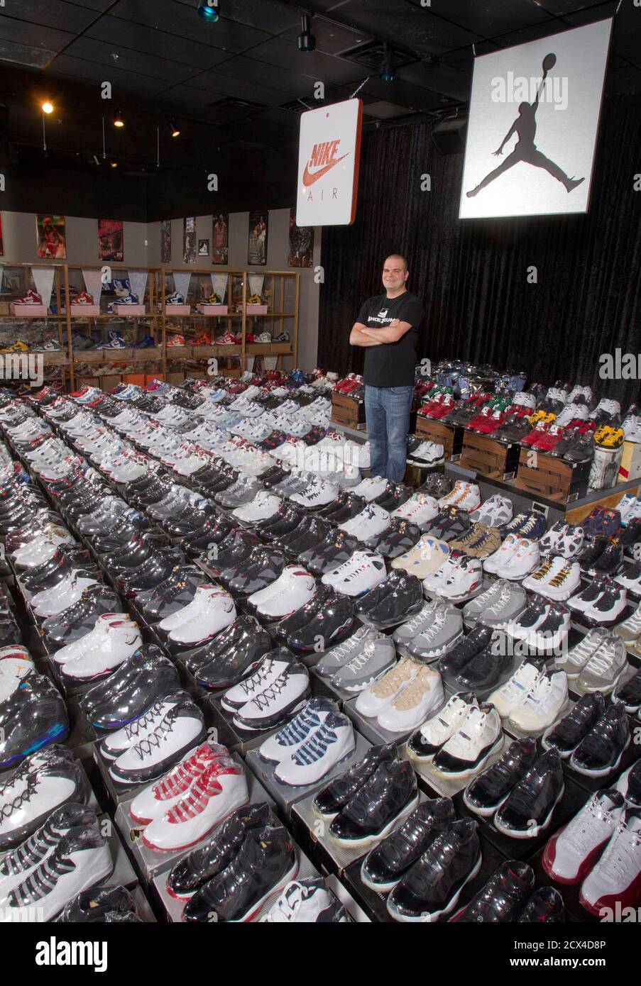 Jordan Michael Geller poses his collection of the Nike Jordan Retro line at the "ShoeZeum" in downtown Las Vegas, Nevada September 25, 2012. Record at the Guinness Book of