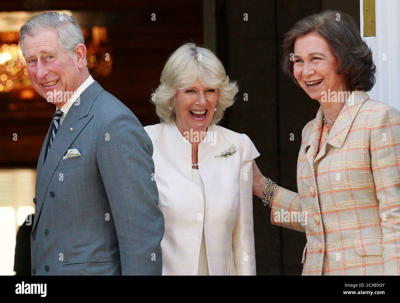 britains-prince-charles-his-wife-camilla-c-duchess-of-cornwall-and-spains-queen-sofia-r-share-a-laugh-before-a-private-lunch-at-zarzuela-palace-in-madrid-march-31-2011-prince-charles-and-his-wife-camilla-the-duchess-of-cornwall-arrived-in-spain-on-an-official-visit-reuters-andrea-comas-spain-tags-politics-royals-2cxb5gy.jpg