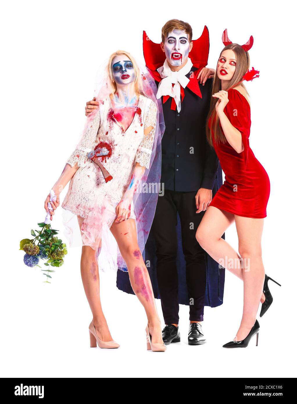 Amigos en Halloween disfraces sobre fondo blanco Fotografía de stock - Alamy