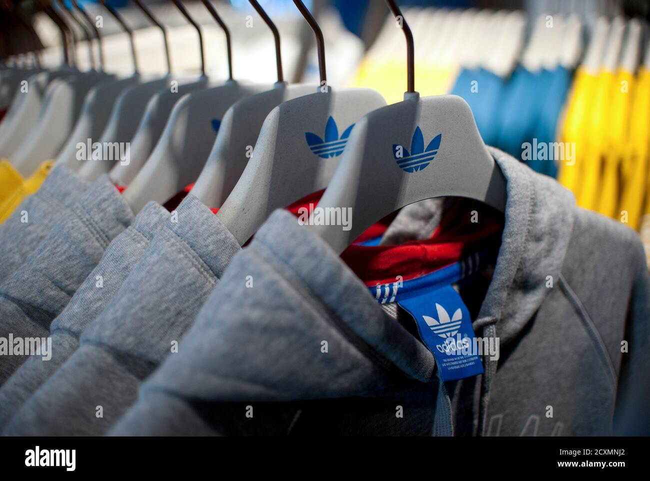 Clothes are pictured in the new Adidas Originals store before the opening in Berlin, March 27, 2014. Adidas has launched a new store blueprint for its fashion brand with a Wi-Fi