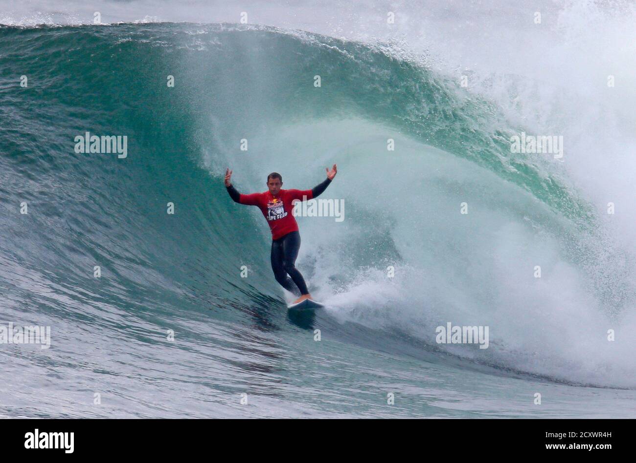 Ryan Hipwood Of Australia Clears The Barrel As He Competes Against Jamie O Brien Of The U S At The Red Bull Cape Fear Invitational Surfing Tournament Off The Shores Of Southern Sydney August Ryan Hipwood Of Australia Clears The Barrel As He Competes Against Jamie O Brien Of The U S At The Red Bull Cape Fear Invitational Surfing Tournament Off The Shores Of Southern Sydney August