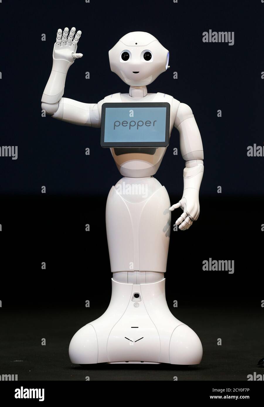 SoftBank Corp. unveils human-like robots named 'pepper' at the company's  news conference in Urayasu, east of Tokyo June 5, 2014. Japan's SoftBank  Corp is developing human-like robots which it will use to