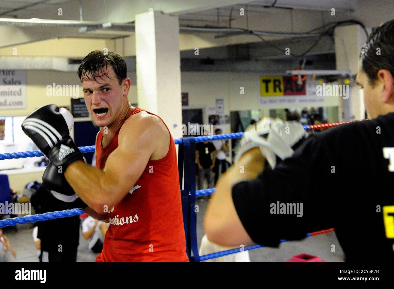 White collar boxers train at the Trad TKO Boxing Gym in London March 28,  2012. Workers in London's financial district known as the "City" are  naturally competitive and having achieved financial success