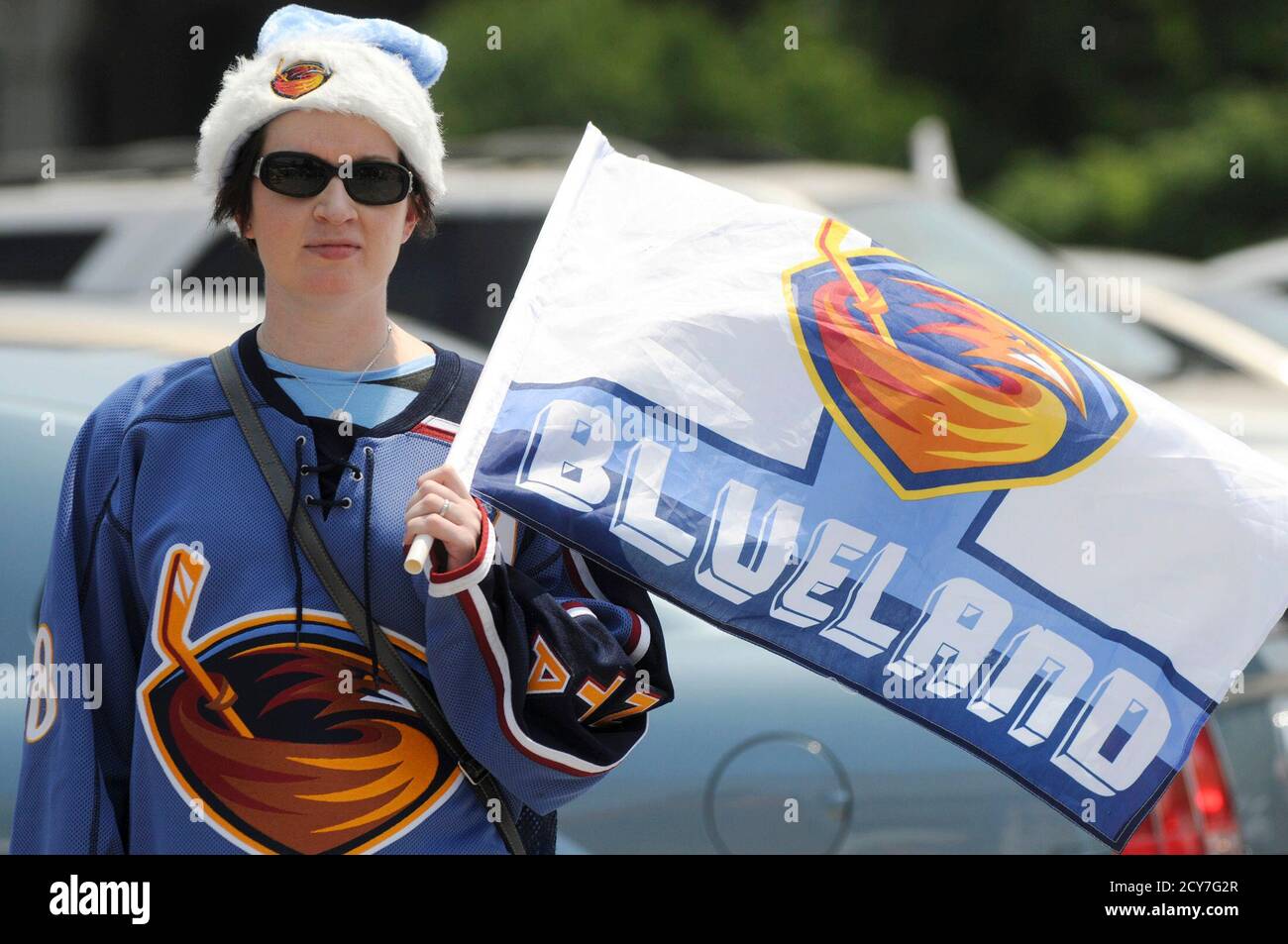 Atlanta Thrashers fan Kelly Adams wears her Thrashers spirit wear during a  rally organized to keep the Atlanta Thrashers hockey team from being sold  and moved out of the city in Atlanta,