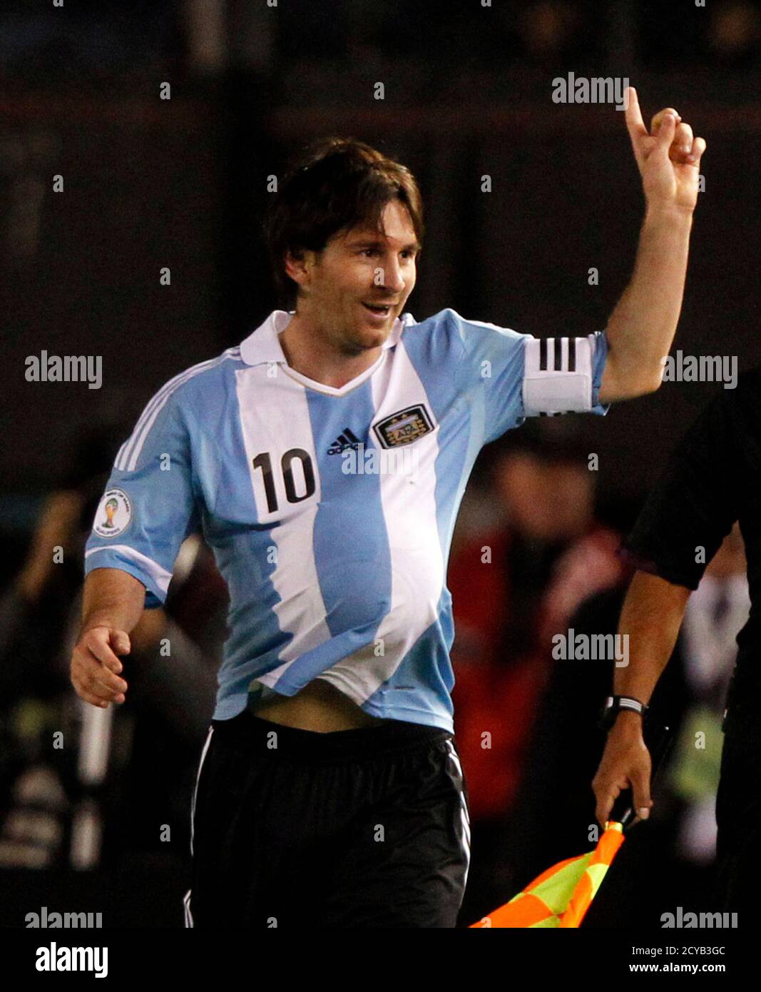 Argentina's Lionel Messi celebrates with a ball under his shirt after his  teammate Sergio Aguero scored a goal against Ecuador during a World Cup  qualifying soccer match in Buenos Aires June 2,