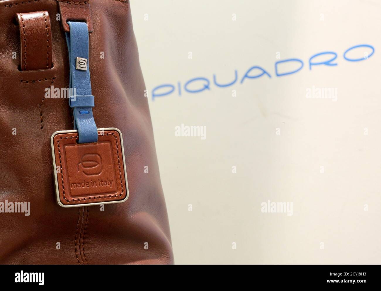 A label with the words "Made in Italy" is seen attached to a Piquadro bag  in this photo illustration taken in Rome November 26, 2014. After years of  moving production to Asia,