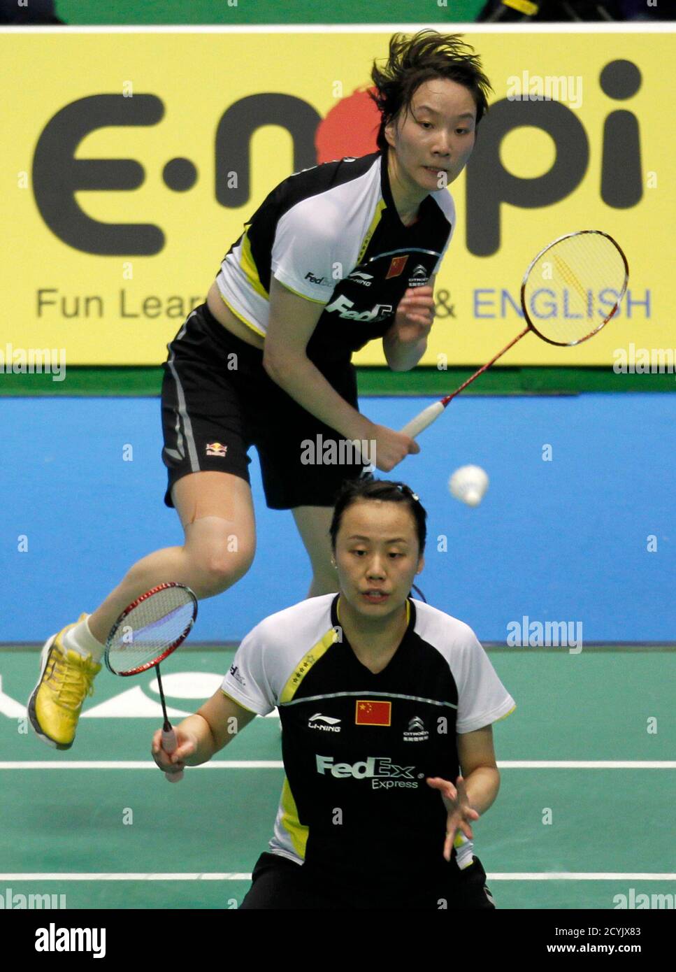 China's Cheng Shu (rear) and Zhao Yunlei return a shot to their compatriots  Yu Yang and Wang Xiaoli during their women's doubles final match at the  Japan Super Series 2010 badminton championships