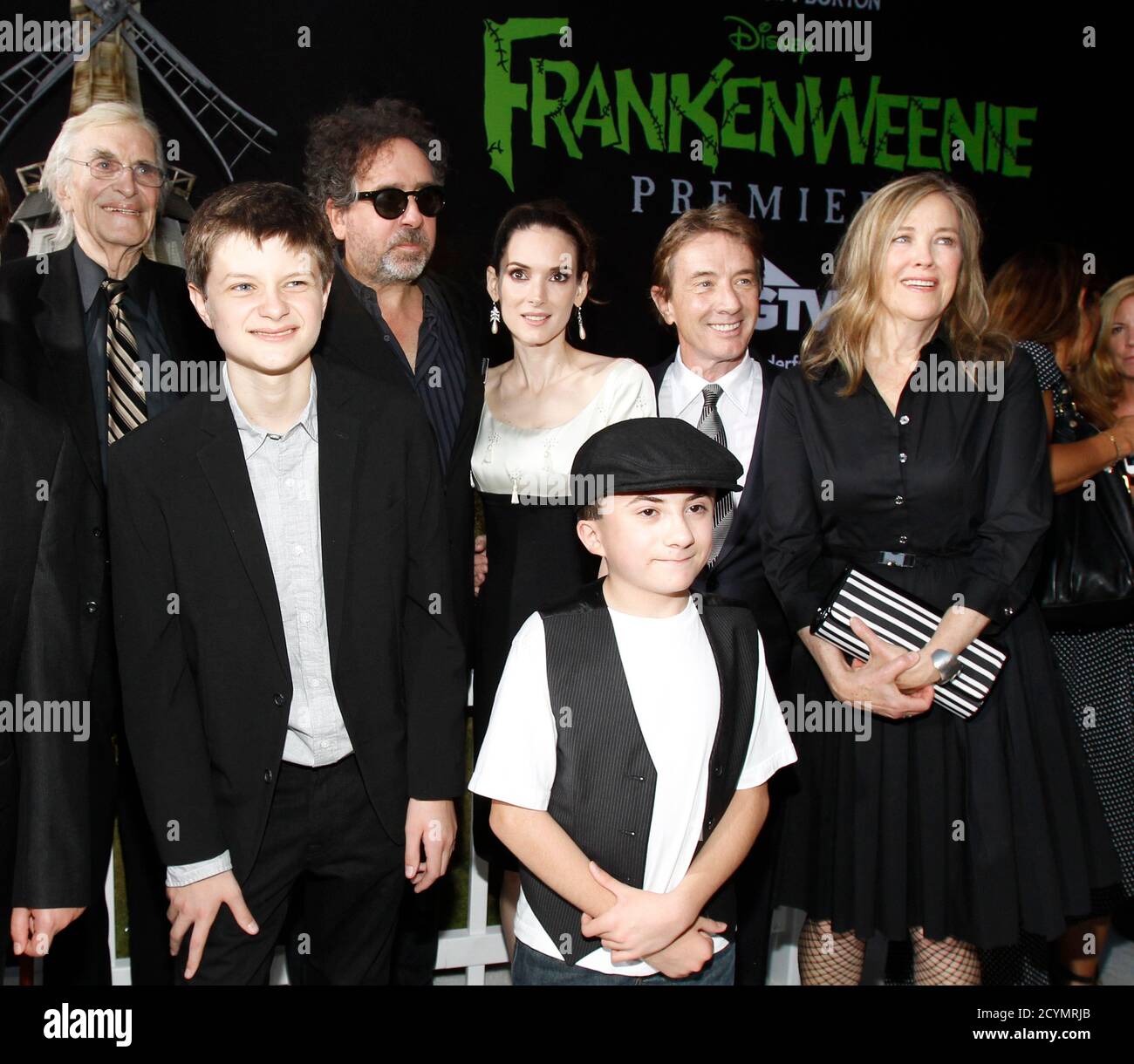Director and producer Tim Burton (3rd L) poses with cast members (from L-R)  Martin Landau, Charlie Tahan, Winona Ryder, Atticus Shaffer, Martin Short  and Catherine O'Hara at the premiere of "Frankenweenie" at