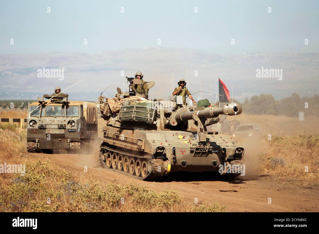 Israeli Soldiers Sit Atop A Mobile Artillery Vehicle Front As They Return From A Drill Near The Quneitra Border Crossing Between Israel And Syria On The Israeli Occupied Golan Heights June 12 13 Israeli Soldiers Sit Atop A Mobile Artillery Vehicle Front As They Return From A Drill Near The Quneitra Border Crossing Between Israel And Syria On The Israeli Occupied Golan Heights June 12 13