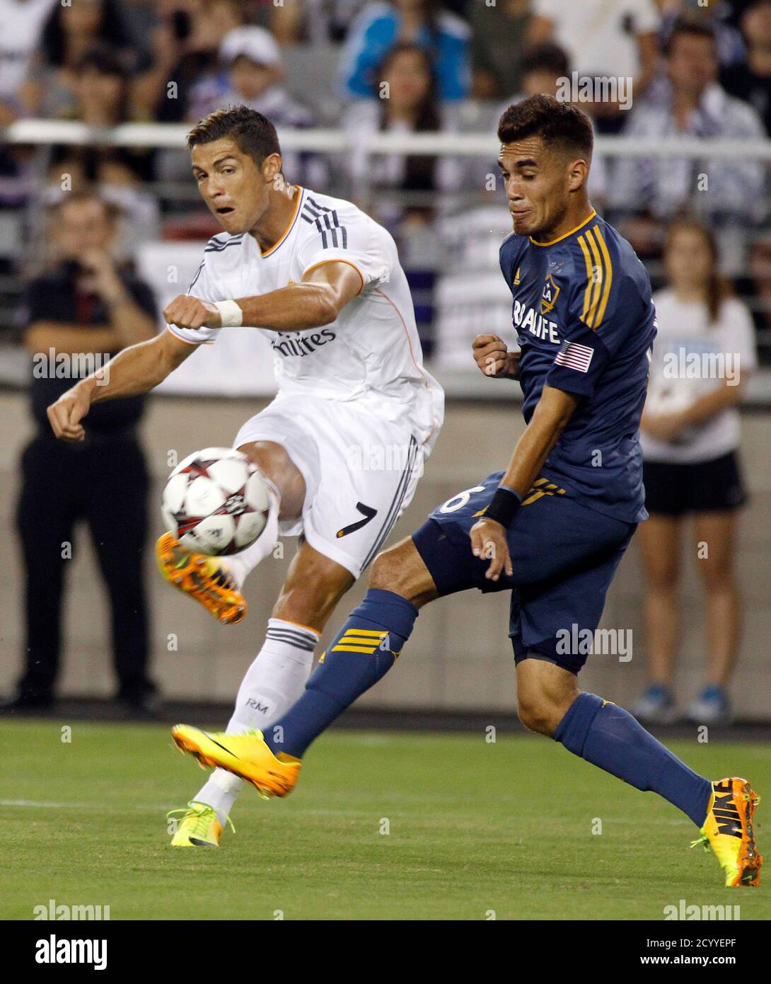 Real Madrid S Cristiano Ronaldo L Shoots The Ball Past L A Galaxy S Hector Jimenez During Their Guinness International Champions Cup Soccer Match In Phoenix Arizona August 1 13 Reuters Ralph D Freso United States
