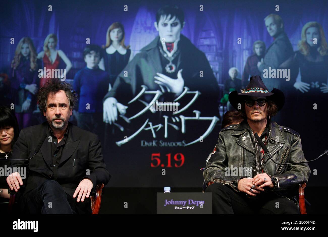 Actor Johnny Depp (R) and director Tim Burton attend a news conference for  their film 
