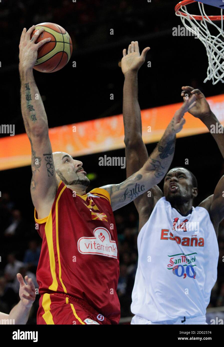 Pero Antic (L) of Macedonia goes to the basket past Serge Ibaka of Spain  during their FIBA EuroBasket 2011 semi-final basketball game in Kaunas  September 16, 2011. REUTERS/Ints Kalnins (LITHUANIA - Tags: