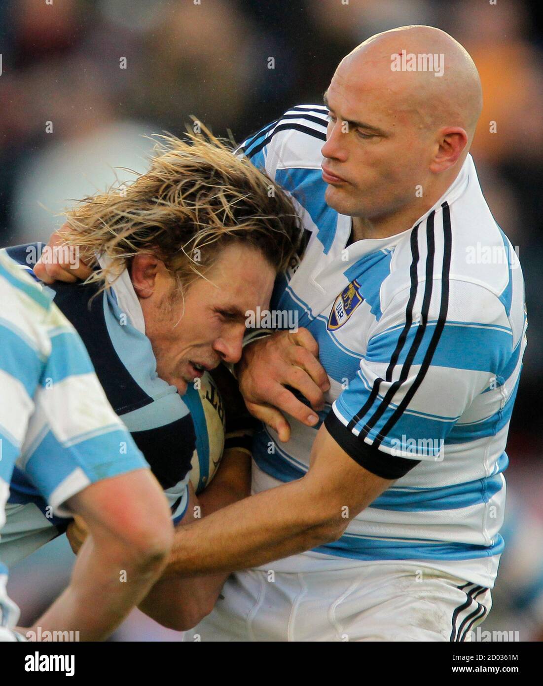 Felipe Contepomi (R) of Argentina's Los Pumas and Gerhard Vosloo of  France's Barbarians battle for the ball during their friendly rugby match  in Buenos Aires June 4, 2011. REUTERS/Enrique Marcarian (ARGENTINA -