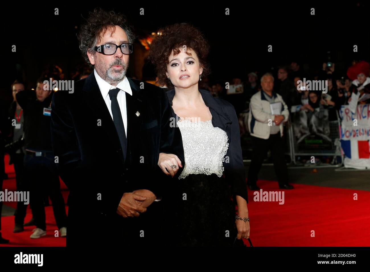 Film director Tim Burton and his wife actress Helena Bonham Carter arrive  for the European premiere of his film "Frankenweenie 3D" at the Odeon  Leicester Square in central London October 10, 2012.