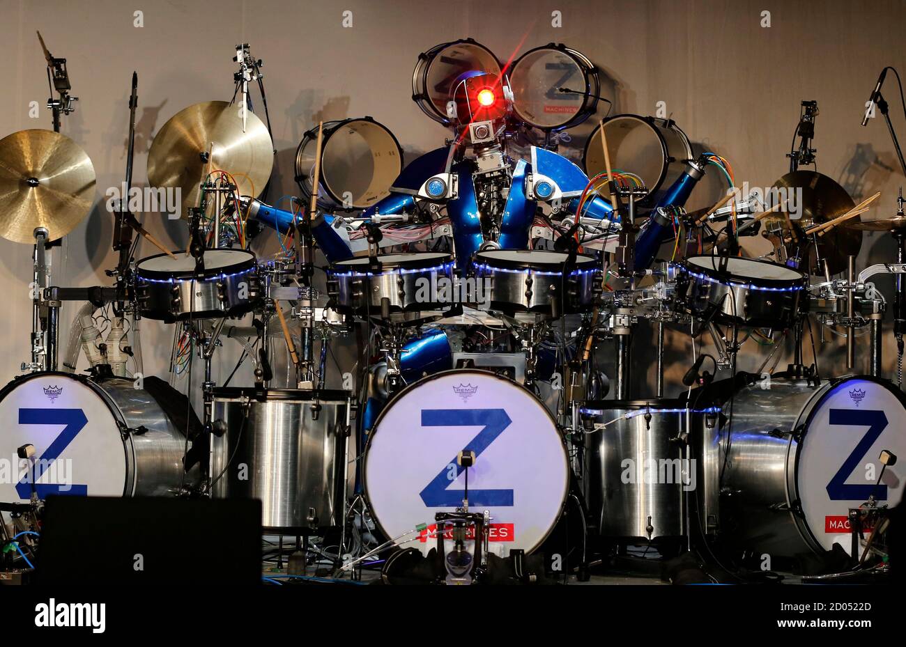 Robot rock band Z-Machines' drummer Ashura performs during the band's debut  live concert in Tokyo June 24, 2013. Three robot rockers took to the stage  in Tokyo on Monday to perform three