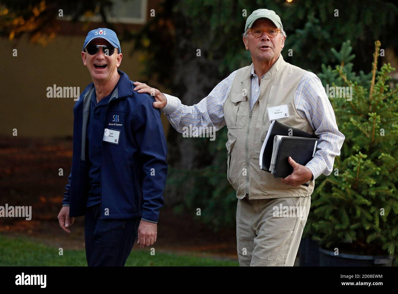Amazon.com Chief Jeff Bezos (L) and former television news anchor Tom  Brokaw attend the Allen & Co Media Conference in Sun Valley, Idaho July 12,  2012. REUTERS/Jim Urquhart (UNITED STATES - Tags: