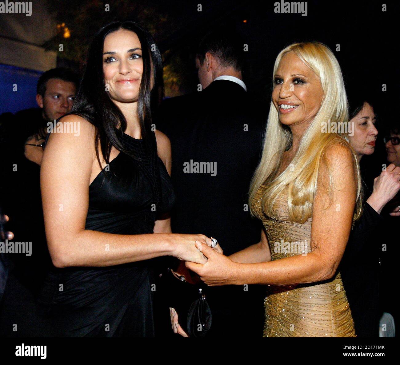Donatella Versace (R) greets actress Demi Moore at the Rodeo Drive Walk of  Style Award event honoring Italian fashion designers Donatella Versace and  her late brother Gianni, in Beverly Hills California February