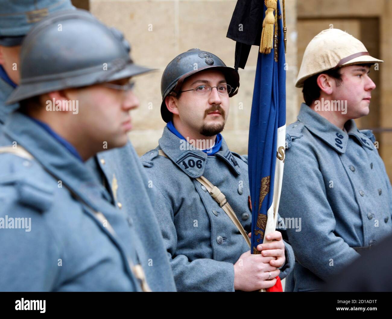 French soldiers dressed in the WWI uniforms are seen before a ceremony to  pay tribute to the dead of World War One in a state funeral for Lazare  Ponticelli, aged 110, France's