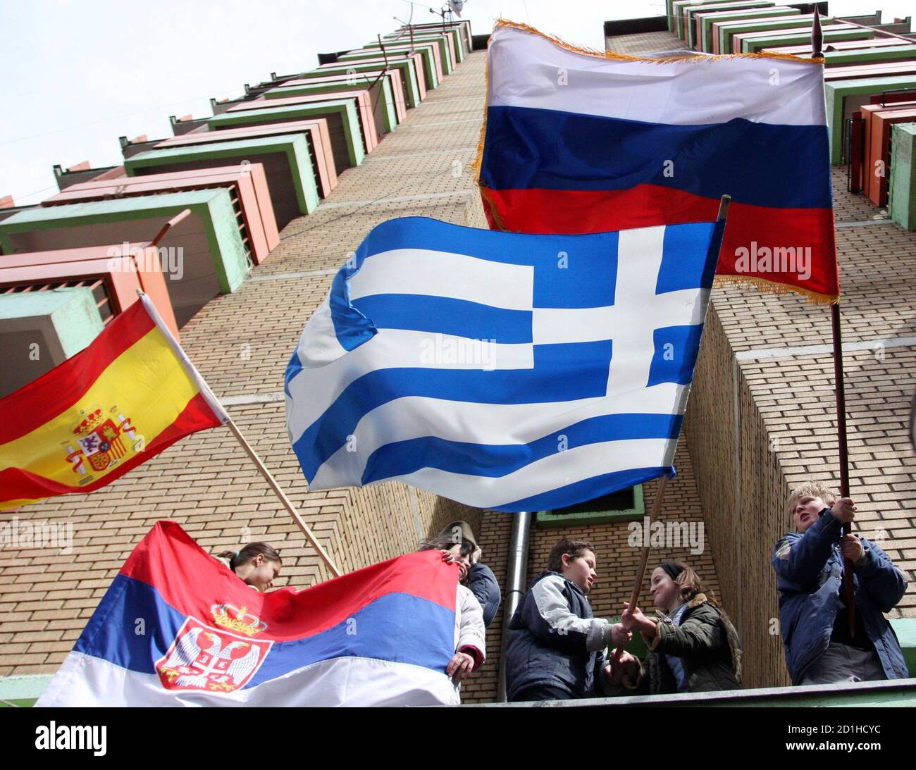 children-wave-flags-of-serbia-spain-greece-and-russia-during-a-protest-in-the-northern-part-of-mitrovica-march-25-2008-spain-greece-and-russia-are-among-the-countries-which-are-not-recognizing-kosovos-independence-reuters-nebojsa-markovic-serbia-2d1hcyc.jpg
