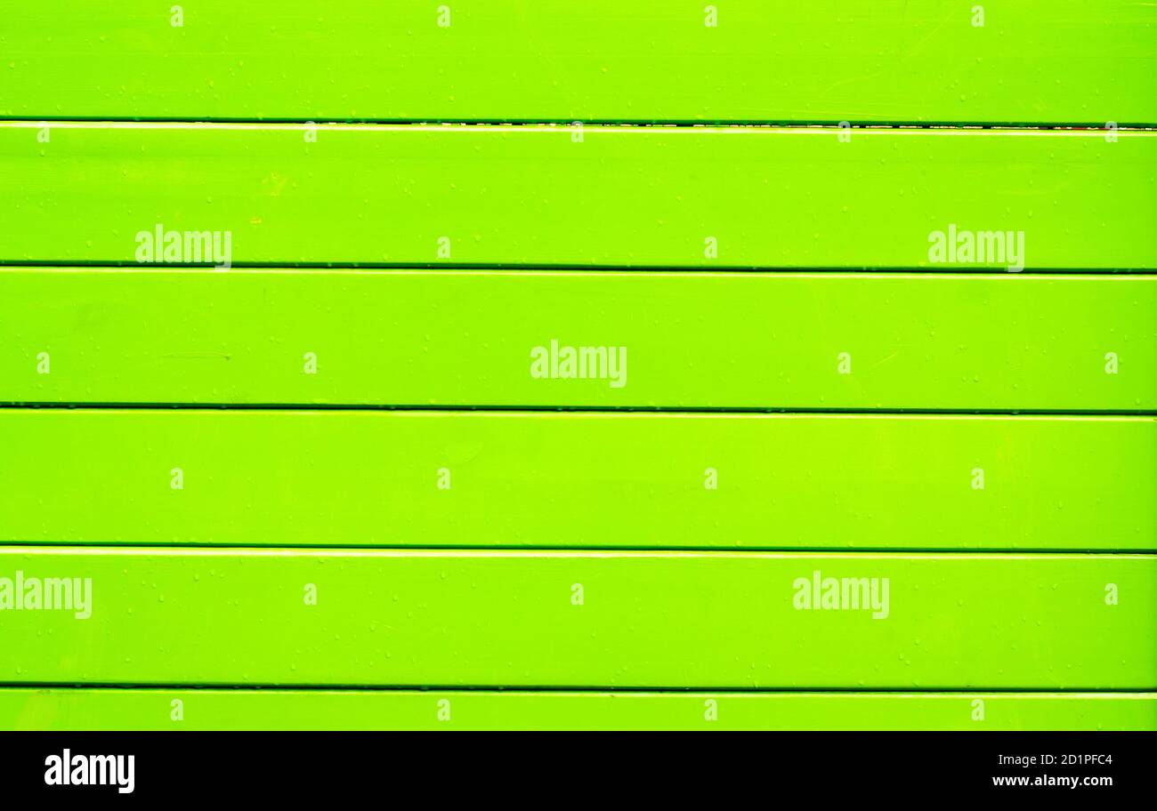Fondo de las tablas verdes claras. Escudo de madera de color brillante. Foto de stock