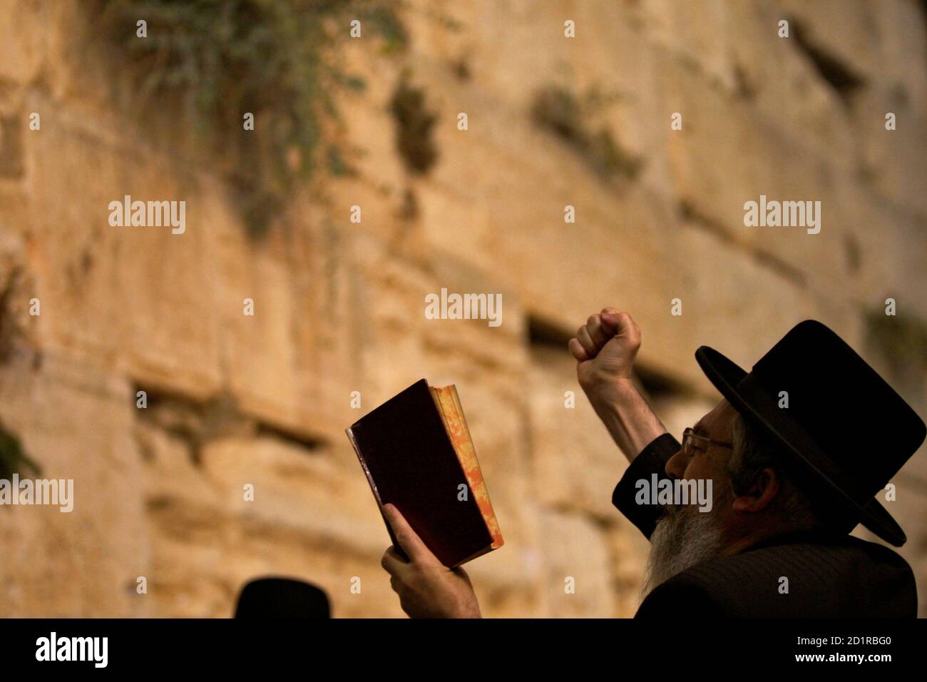 An ultra-Orthodox Jew recites prayers 