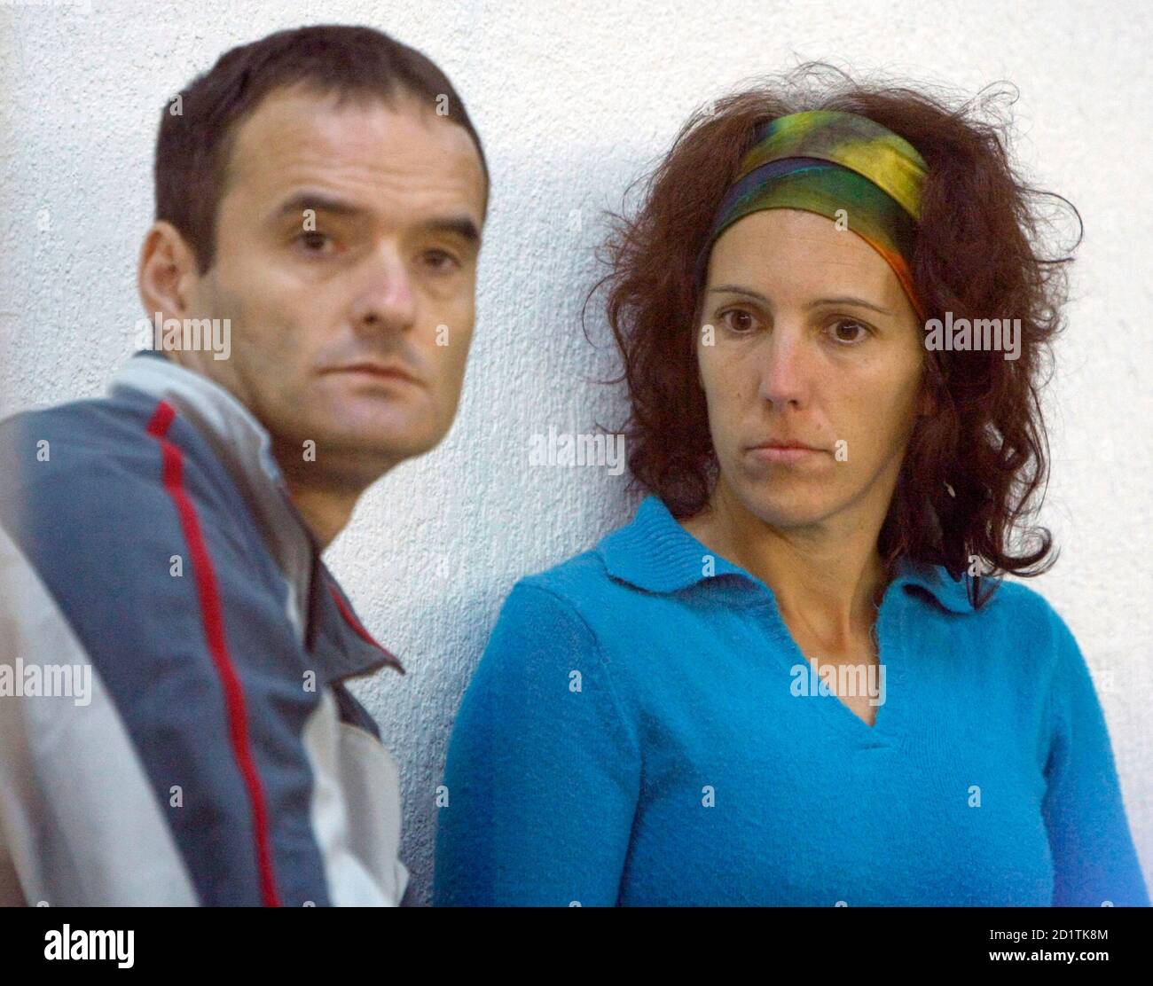 Alleged ETA leaders Juan Antonio Olarra Guridi (L) and Ainhoa Mugica Goni  attend their trial at Spain's High Court in Madrid September 28, 2007.  Olarra and Mugica are accused of participating in