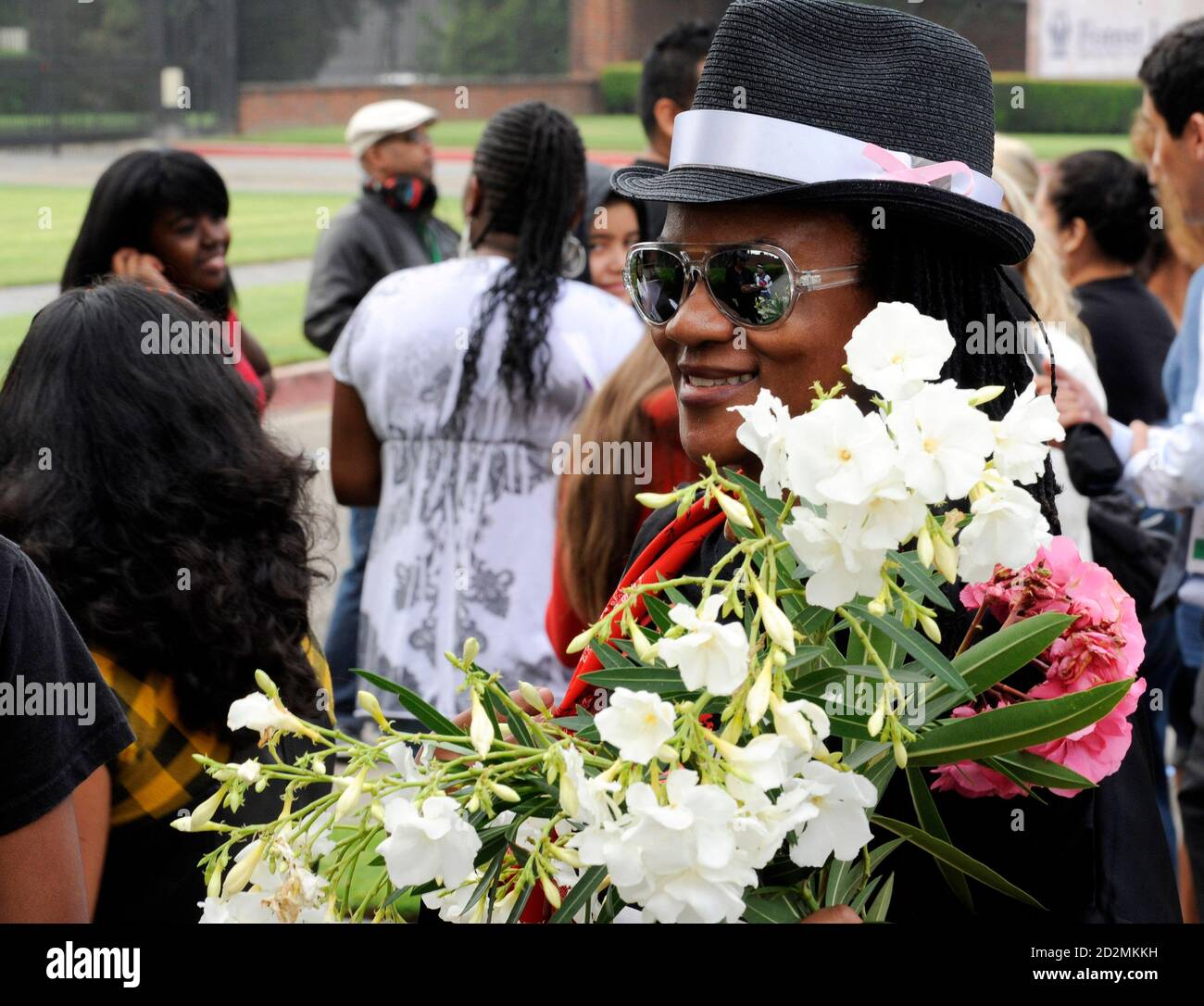 Brie Smyth of Oceanside, California, waits to pay tribute to the late pop  star Michael Jackson a year after his death at his grave site at Forest  Lawn Memorial Parks and Mortuaries