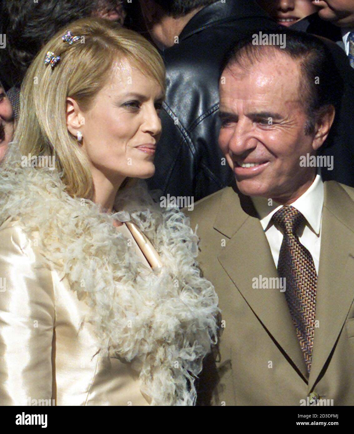 Former Argentine President Carlos Menem And Chile S Former Miss Universe Cecilia Bolocco Walk Out Of The Governor S Mansion In The Capital City Of Menem S Home Province La Rioja After Being Married In