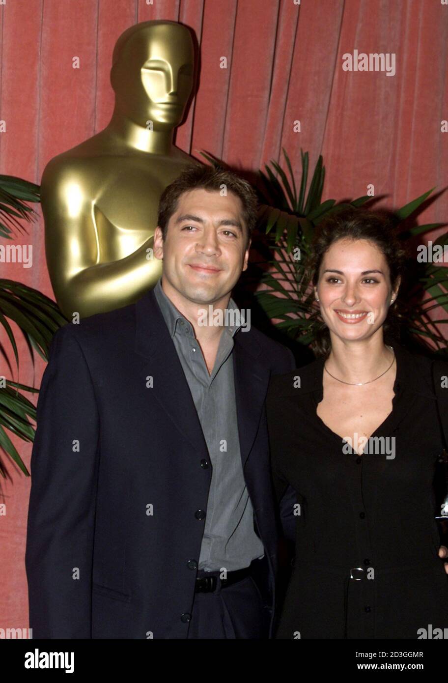 Spanish actor Javier Bardem poses with girlfriend Christina Pales as he