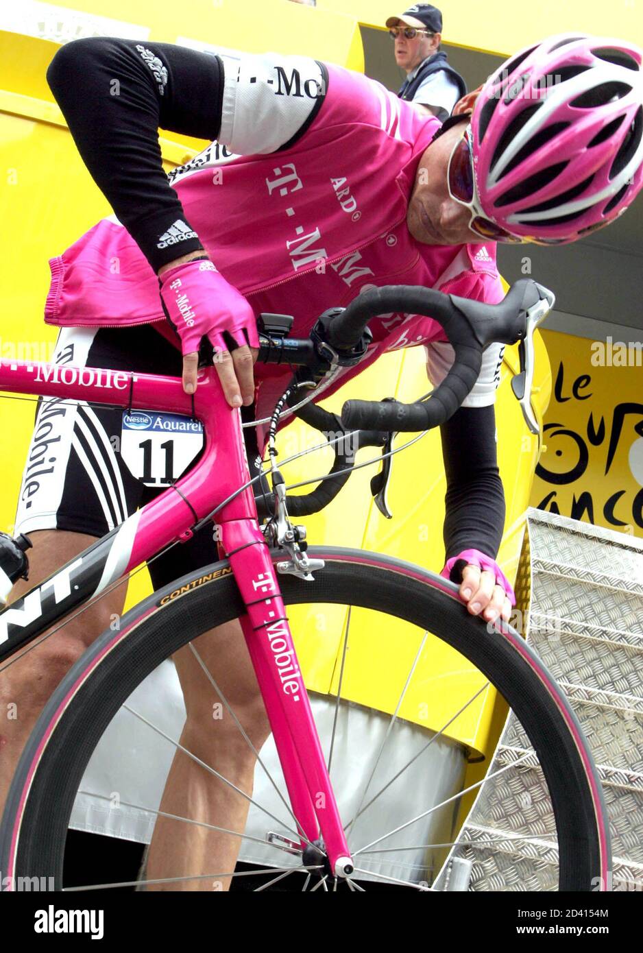 T-Mobile team rider Jan Ullrich of Germany checks his bike before the start of the 160.5 km long ninth stage of the Tour de France from St.-Leonard-de-Noblat to Gueret, July 13,