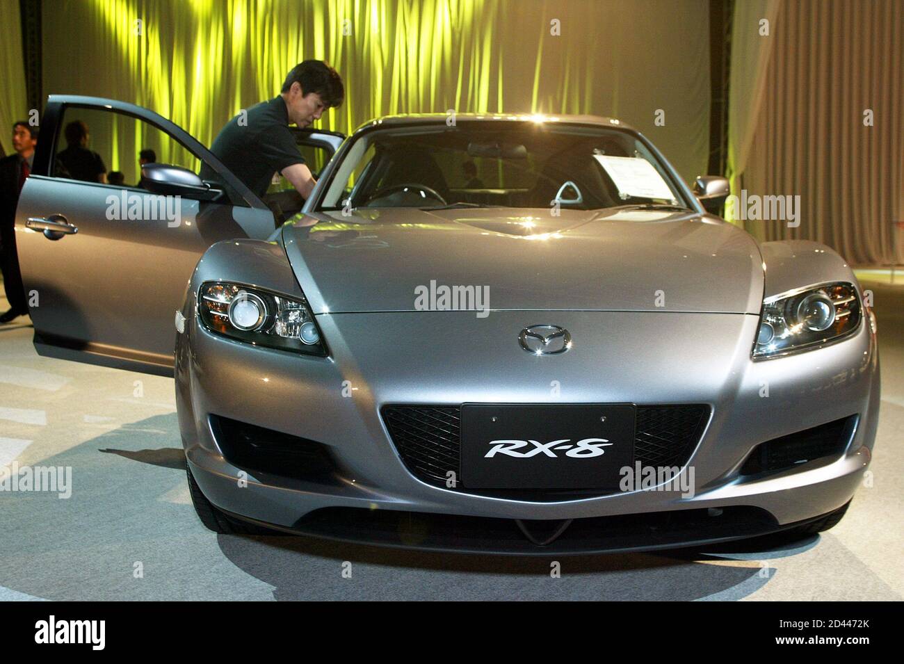 Mazda Motor Corp's new fourdoor fourseater Mazda RX8 is unveiled in