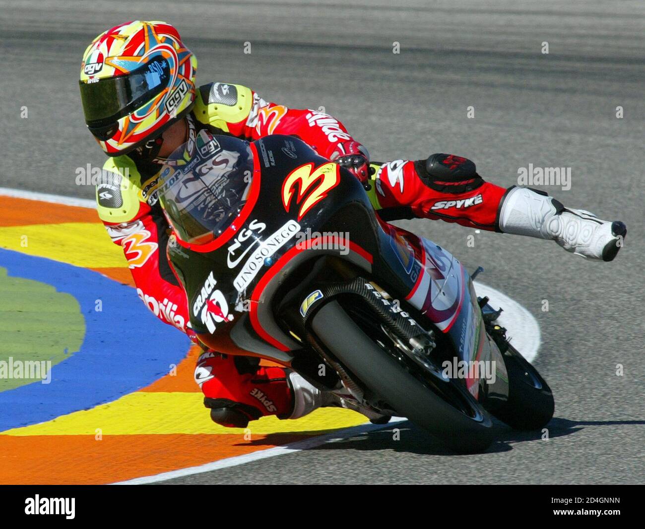 Spanish 125cc Hector Barbera rides his Aprilia during qualifying practice  at the Valencia Motorcycle Grand Prix. Spanish 125cc Hector Barbera rides  his Aprilia during the qualifying practice at the Valencia Motorcycle Grand