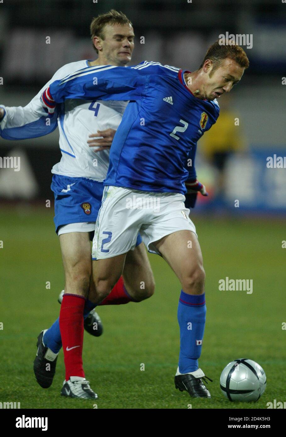 Japan S Under 23 Defender Marcus Tulio Tanaka R Fights For The Ball With Russia S Defender Pavel Mogilevsky During A Friendly Soccer Match At Shizuoka Stadium In Kakegawa In The Central Japan On February Japan S Under 23 Defender Marcus Tulio Tanaka R Fights For The Ball With Russia S Defender Pavel Mogilevsky During A Friendly Soccer Match At Shizuoka Stadium In Kakegawa In The Central Japan On February