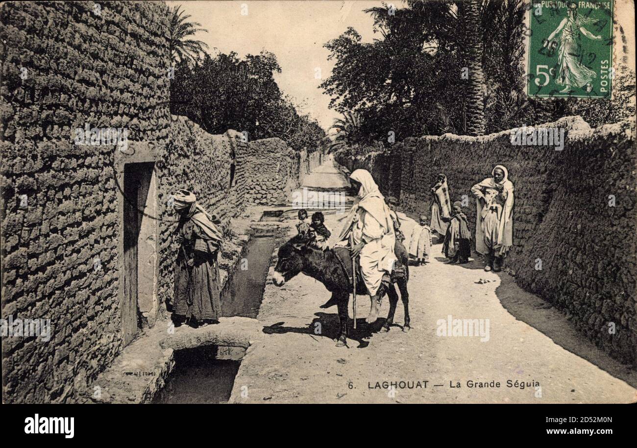 Laghouat Algerien, la Grande Seguia, Mann auf Esel, Kanal, Einheimische | uso en todo el mundo Foto de stock