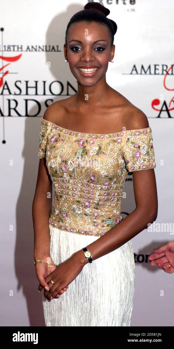 Miss Universe 1999 Mpule Kwelagobe poses for photographers as she arrives  at the 18th Annual American Fashion Awards in New York City, June 2. The  show is held to honour the talent
