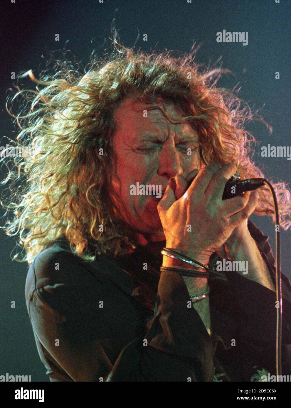 Rock legend Robert Plant sings during "The voice and the guitar of Led