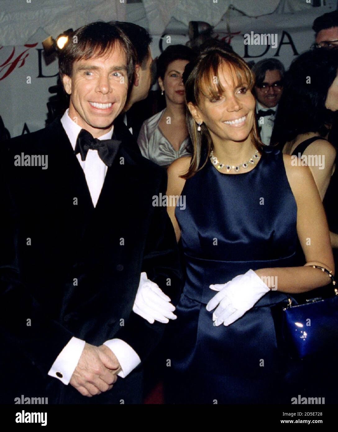 Fashion designer Tommy Hilfiger and his wife Susan arrive at the Council of  Fashion Designers of America awards, February 12 in New York. Hilfiger was  named designer of the year for menswear