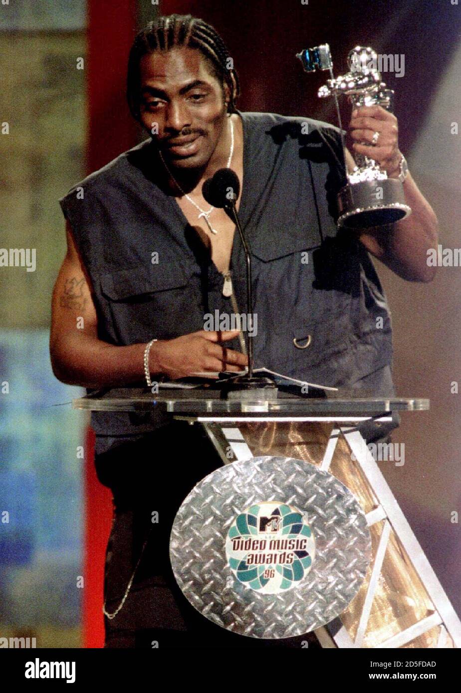Rapper Coolio holds the award he won for best rap video for "Gangsta's  Paradise" at the 1996 MTV Music Video Awards at Radio City Music Hall in  New York September 4. Coolio