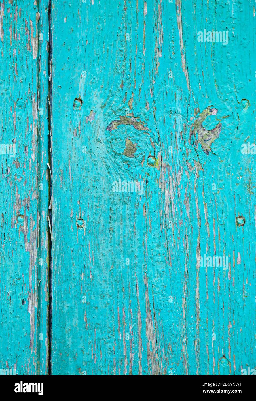 Madera envejecida pintada en color turquesa. Foto de stock