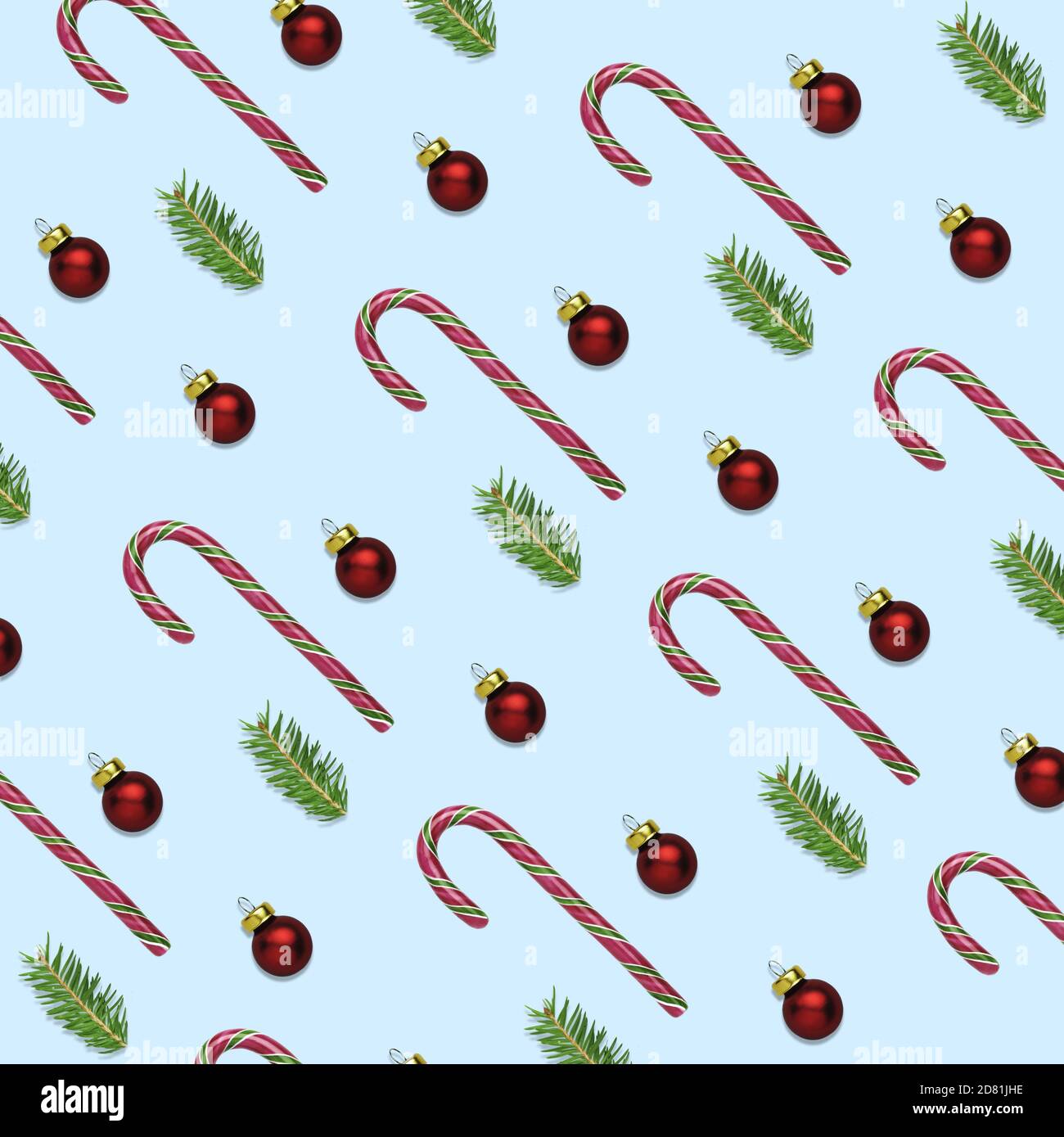 Ilustración 3D de fondo azul de Navidad o año Nuevo con bastón de caramelo, bola roja y rama de abeto. Concepto de papel para envolver para el invierno Foto de stock