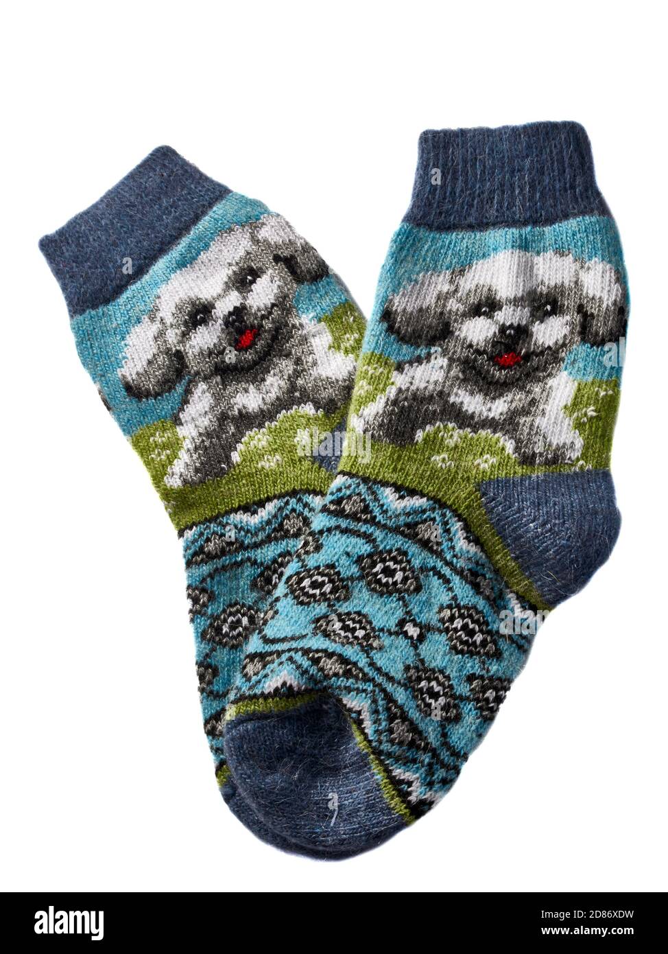 Un par de calcetines de lana sobre un fondo blanco Foto de stock