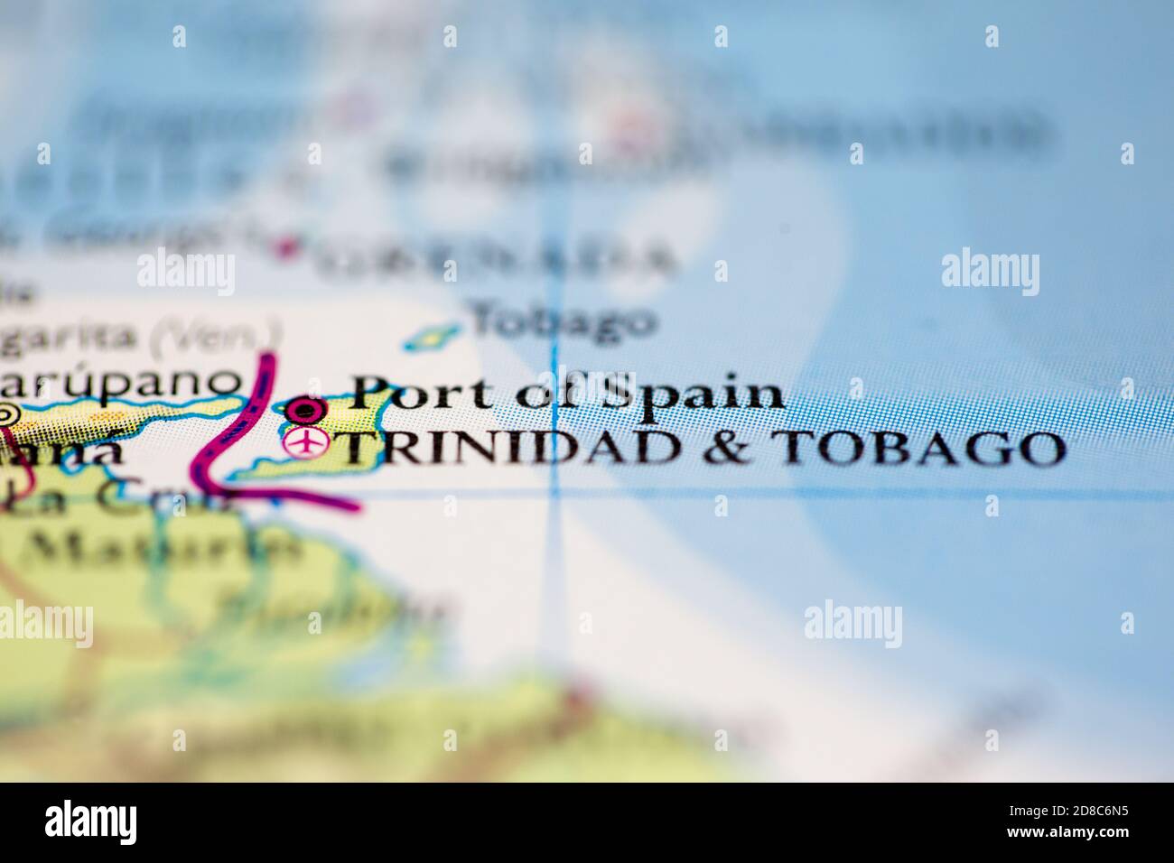Profundidad de campo reducida se centra en la ubicación del mapa geográfico  de Puerto de España ciudad Trinidad & Tobago Sudamérica continente en el  atlas Fotografía de stock - Alamy